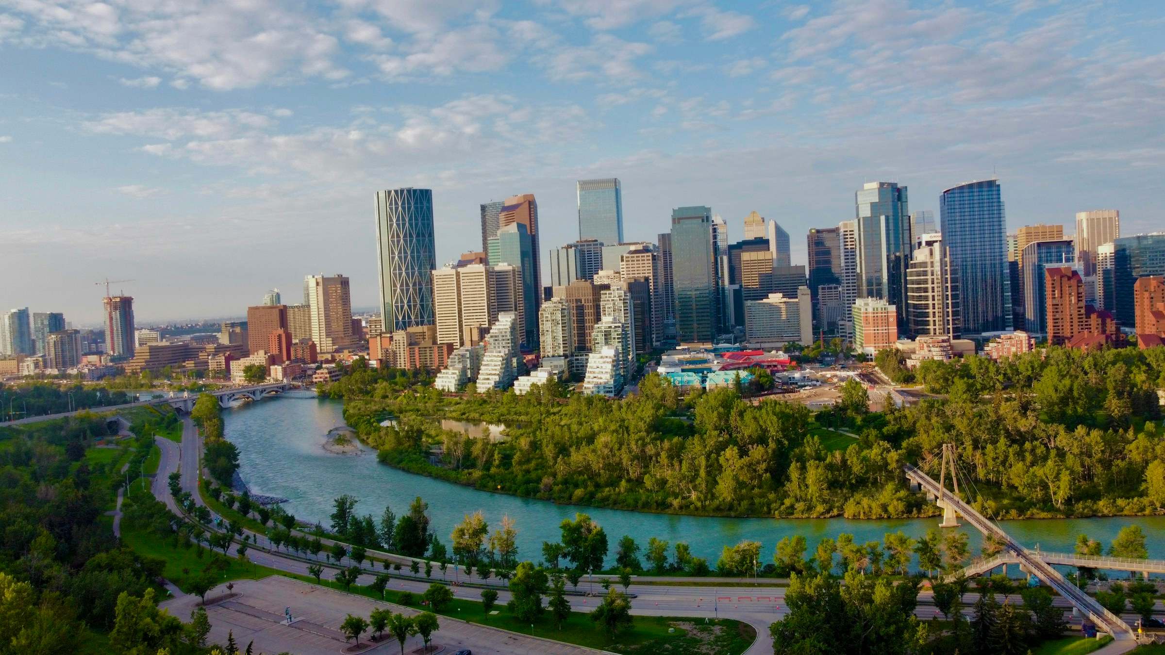 The Bow River curving past downtown Calgary in summer